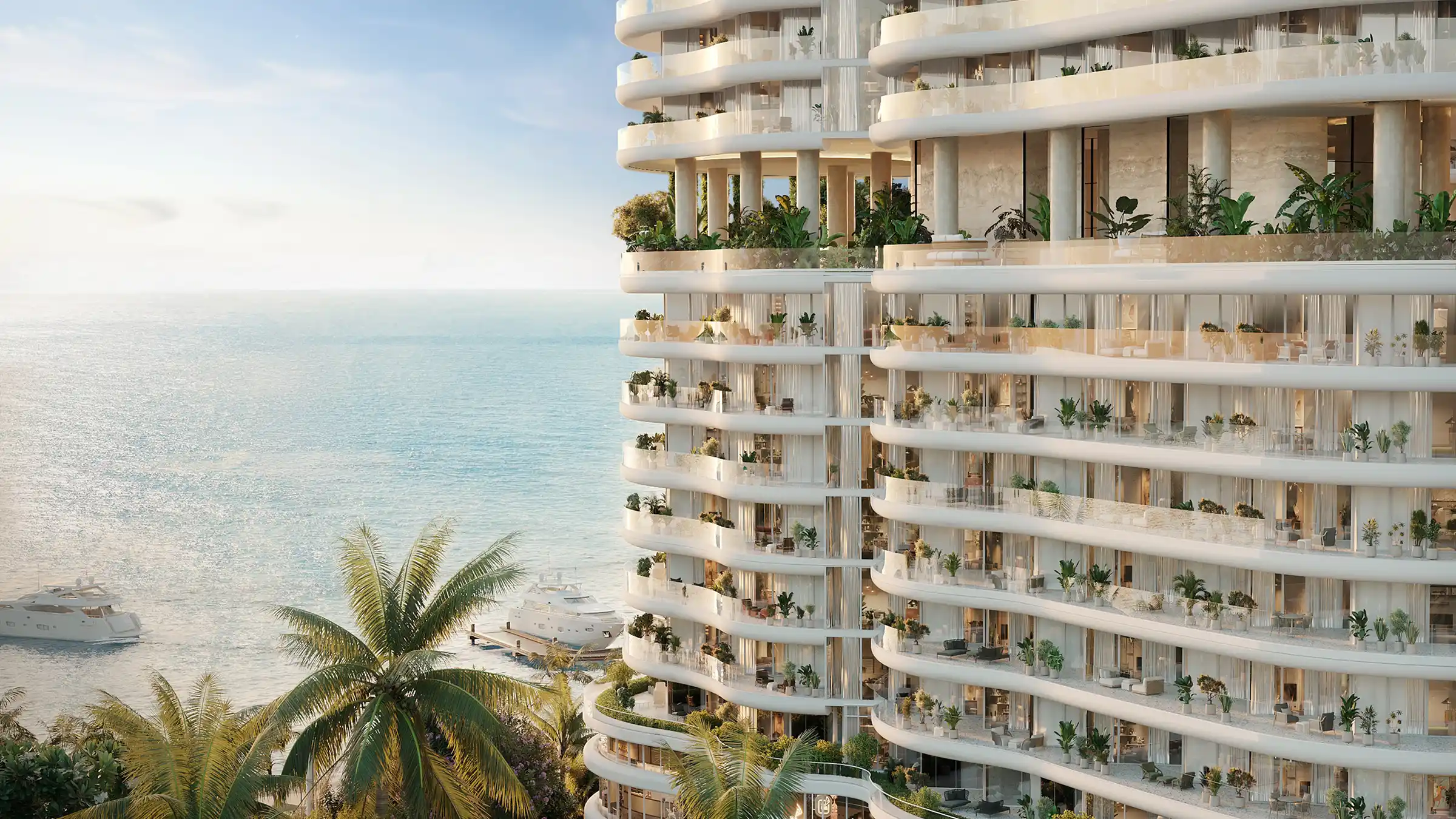 AMRA beachfront infinity pool under palm trees