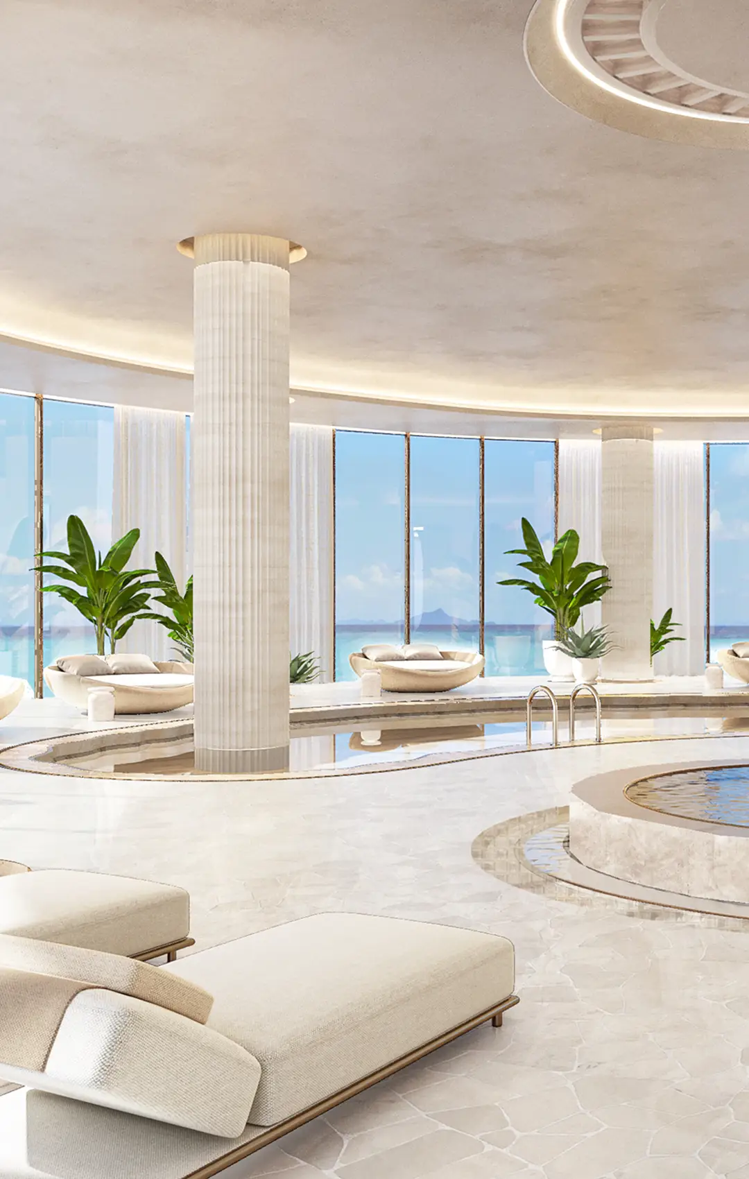 AMRA beachfront infinity pool under palm trees